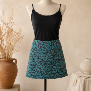 Jupe portefeuille réversible courte coton motif éventails turquoise.